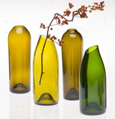 Hvordan å resirkulere vinflasker. Lag den tradisjonelle, inspirerende vinflaske stearinlys.