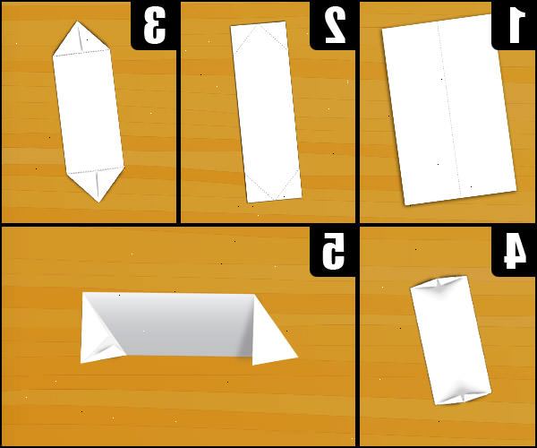 Hvordan lage et papir fotball. Finn en 8 ½ "med 11" ark.