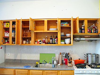 Hvordan organisere et kjøkken. Kaste noe du ikke bruker.