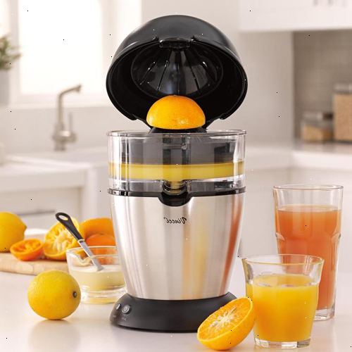 Hvordan lage appelsinjuice. Myker opp den oransje.